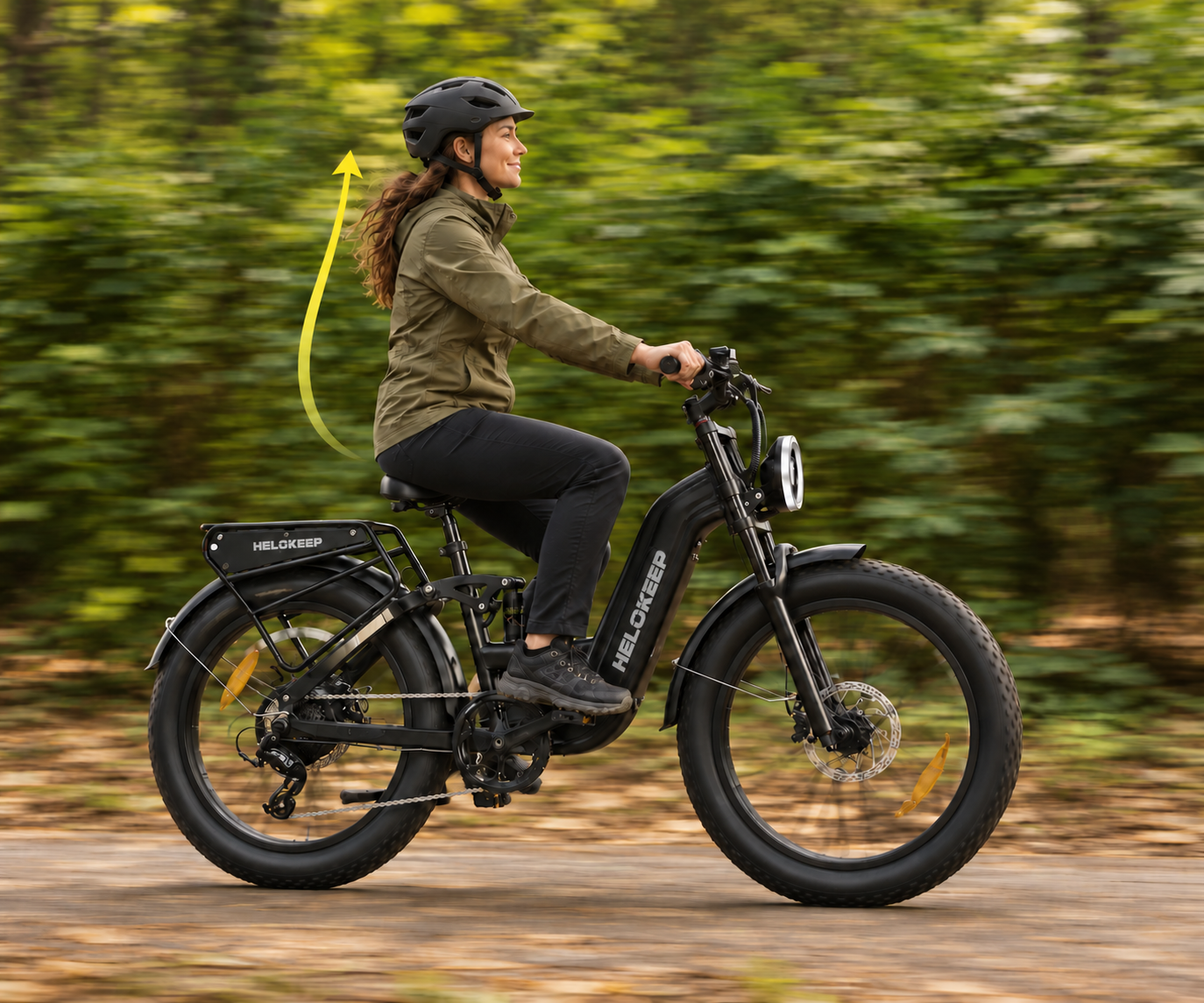 Woman riding a black Helokeep 26F with a relaxed upright posture on a forest trail