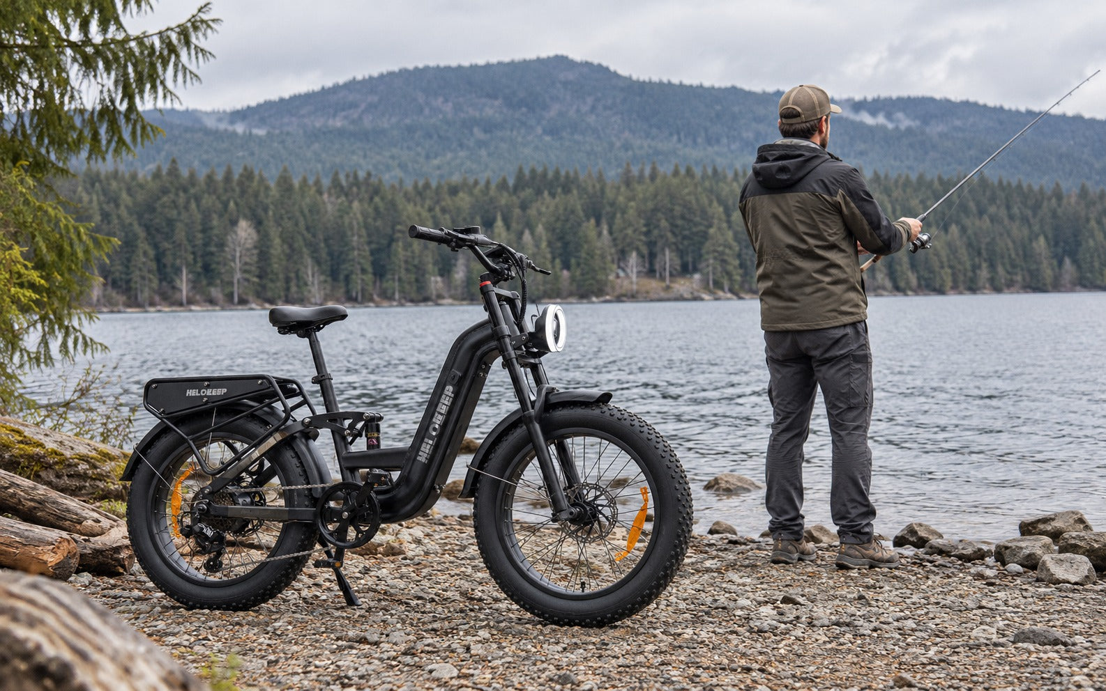 Black Helokeep 26F parked beside an angler at a lake